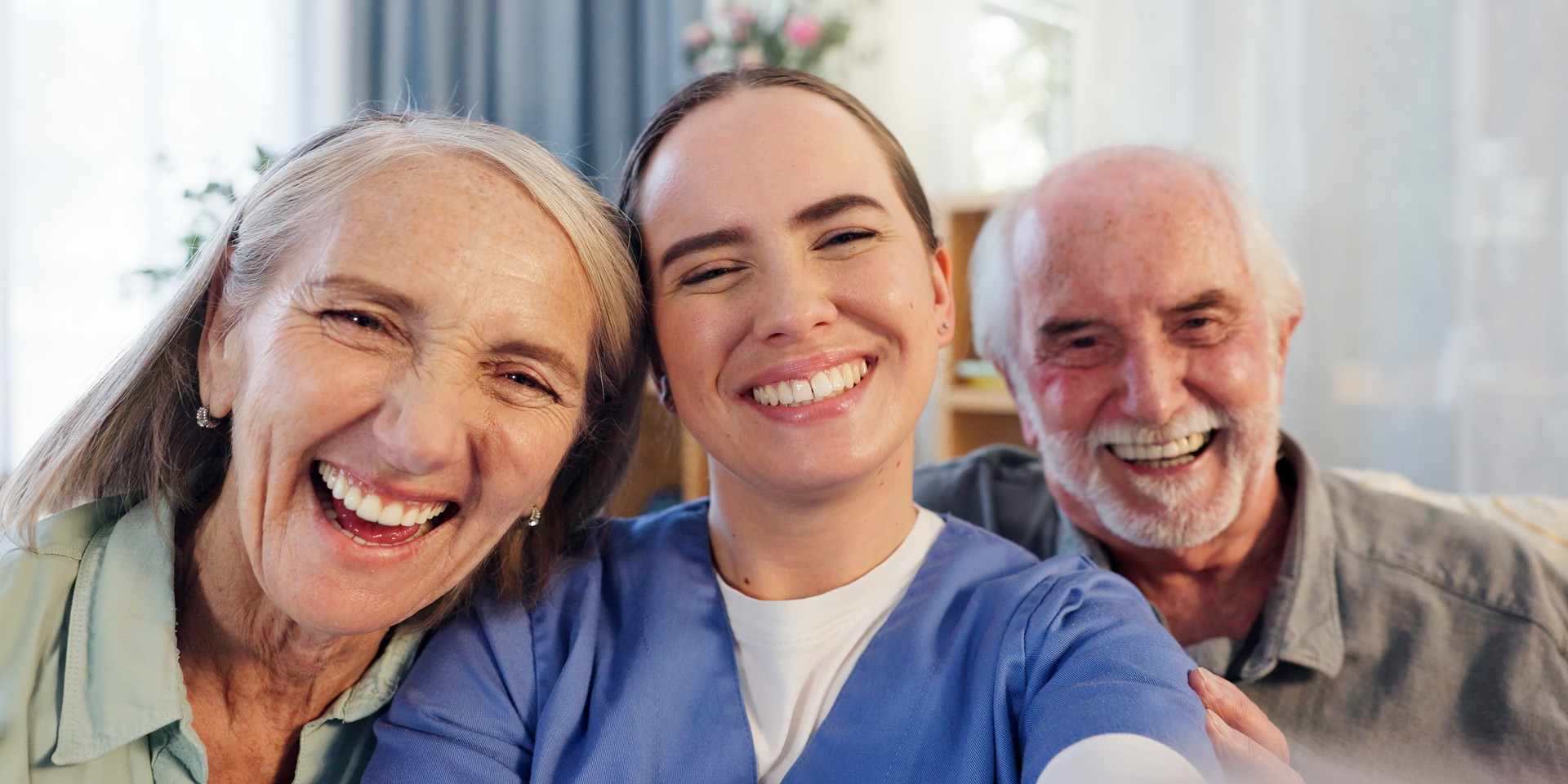 Happy woman, nurse and mature people in selfie for photography, elderly care or retirement in senior home. Medical doctor, caregiver and smile with face of couple for picture, photograph or memory